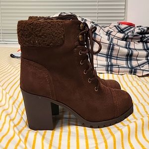 Just above the ankle boots. Brown, zipper up the side, 3 inch heels